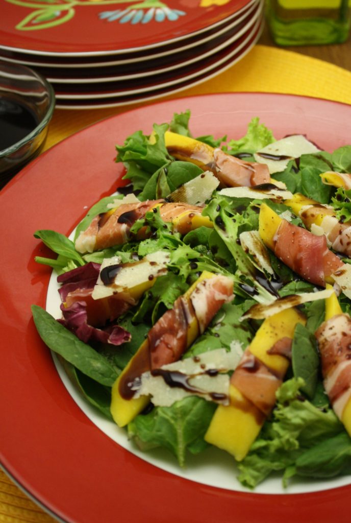 Prosciutto-Wrapped Mango with Balsamic Reduction