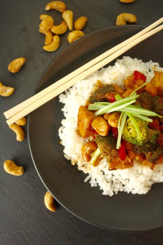 This Cashew Chicken is a perfect go-to dish when dinner in a hurry is what’s on the menu. If you’re like me – a dedicated apostle in the church of the boneless, skinless chicken breasts and thighs – you’ll have these on hand All. The. Time. Add your favorite veggies, a l’il sauce, a quick turn in a really hot pan and you’ll have dinner on the table in minutes! 