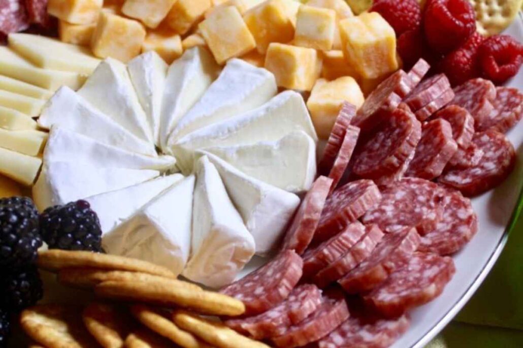 Assorted cheese, charcuterie, crackers and dips