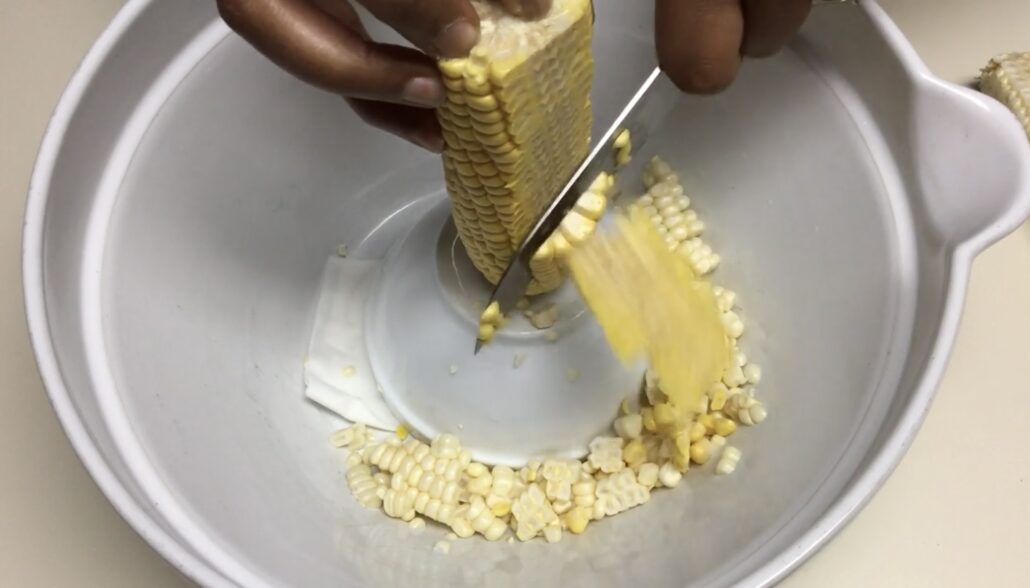 Corn on Cob in Bowl with Knife