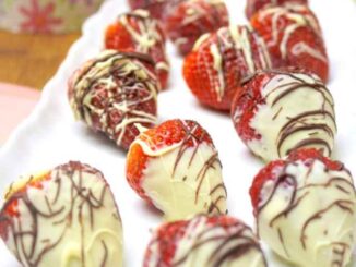 Strawberries stuffed with mascarpone and dipped in white chocolate